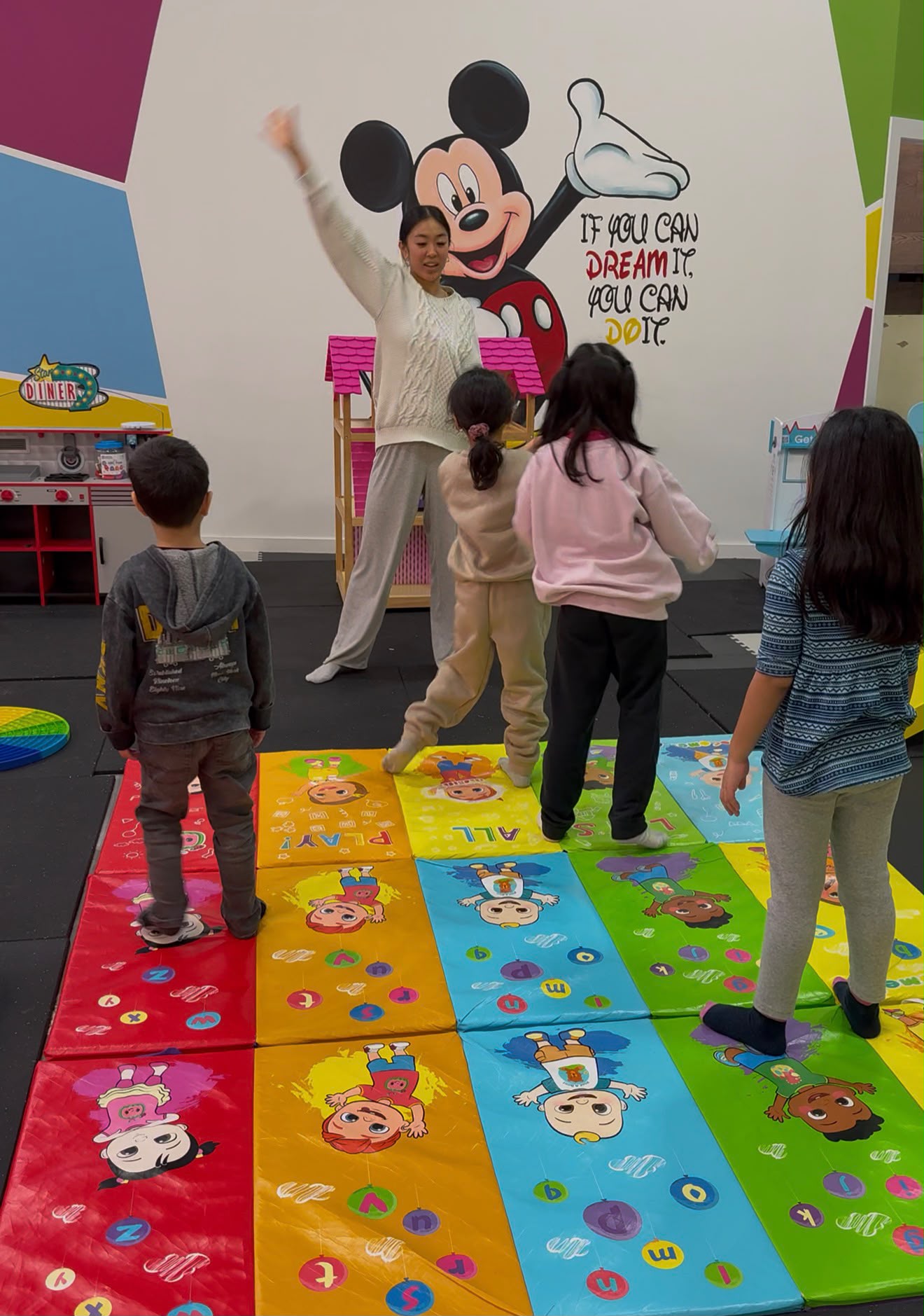 Therapist leading children in a structured group activity at My Empower Therapy