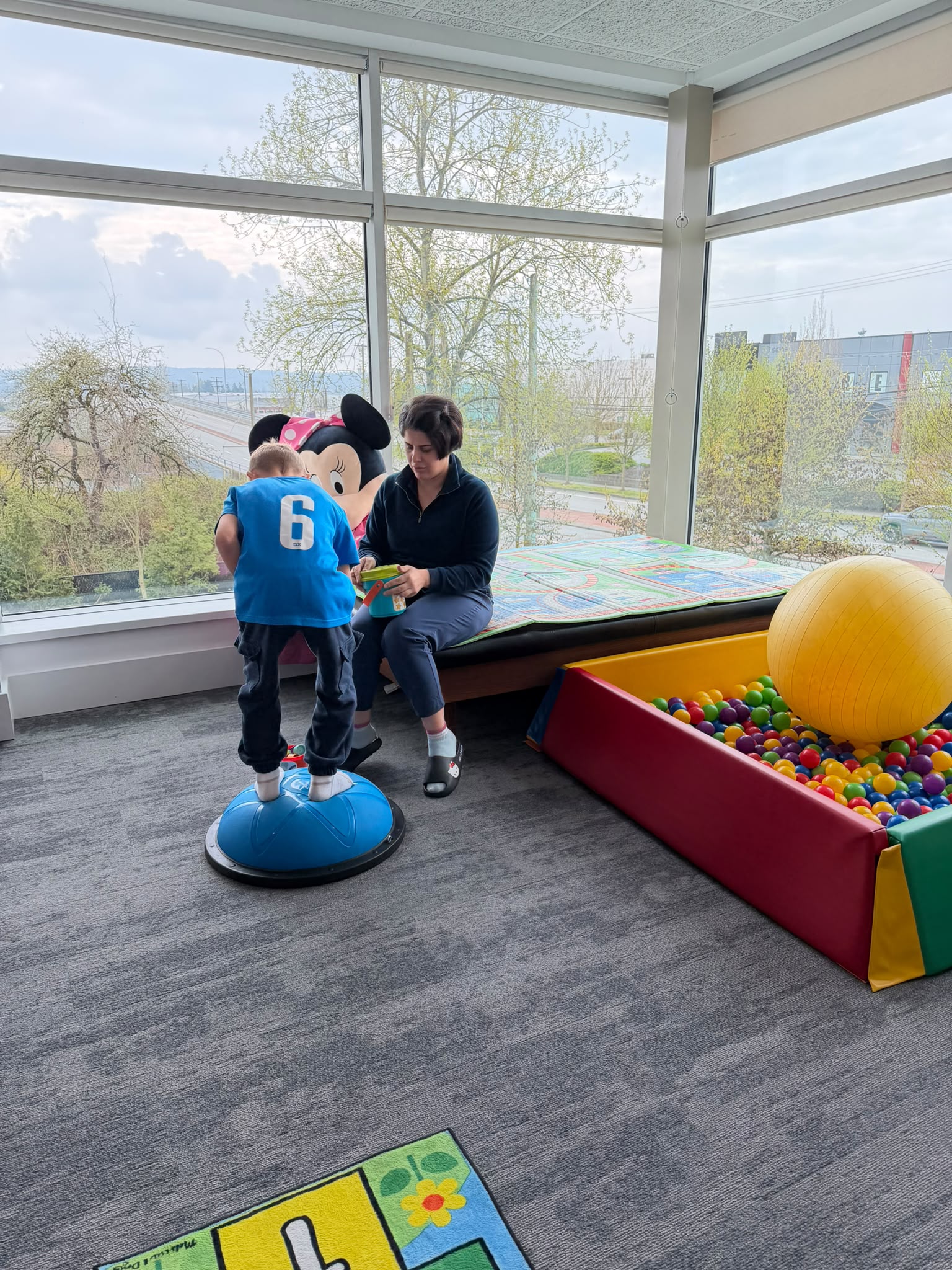 My Empower Therapy therapist working one-to-one with a child in a pediatric clinic