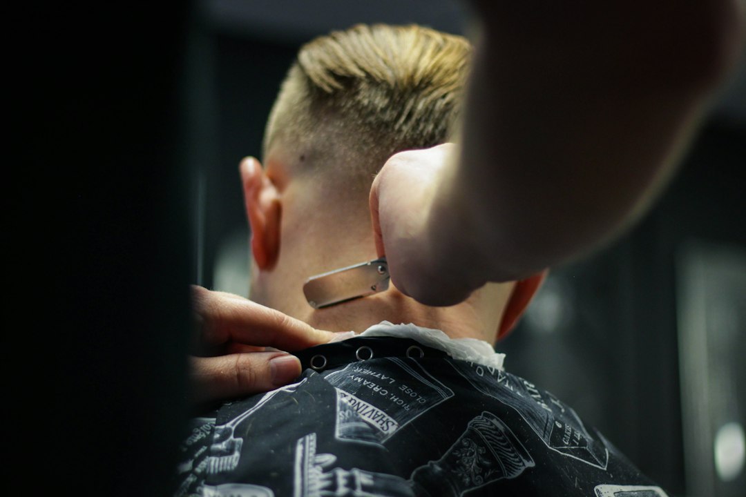 Child receiving a haircut in a calm salon environment